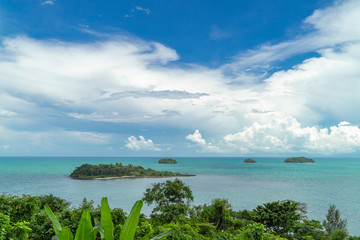 Tropical island surrounded by clear turquoise sea. Thailand.