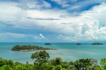 Fototapeta na wymiar Tropical island surrounded by clear turquoise sea. Thailand.