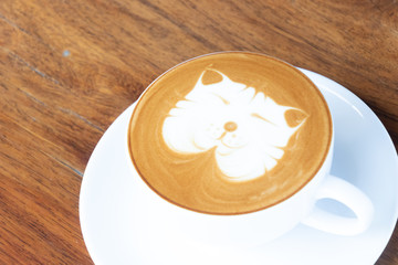 Coffee cup of cappuccino with latte art in coffee shop.Coffee is one of the most popular beverages.Improve Energy Levels and Burn Fat