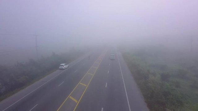 motobike going on a fogy road in chiangmai