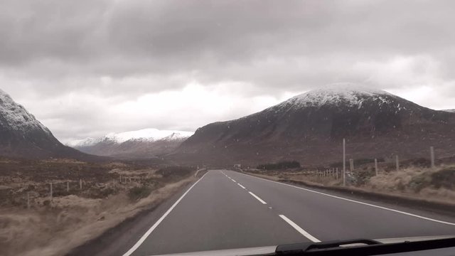 POV driving through the Scottish Highlands, UK.
