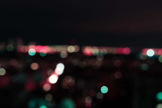 blurred background at night with colorful bokeh lights © LIGHTFIELD STUDIOS