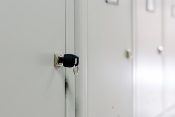 Concept of security. Metal locker storage of personal belongings in a public place or warehouse. close-up. selective focus. copy space for decor or design
