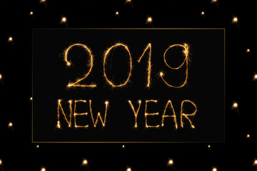 close up view of 2019 new year light sign on black background