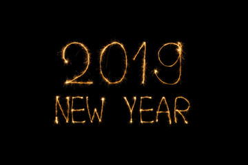 close up view of 2019 new year light sign on black background