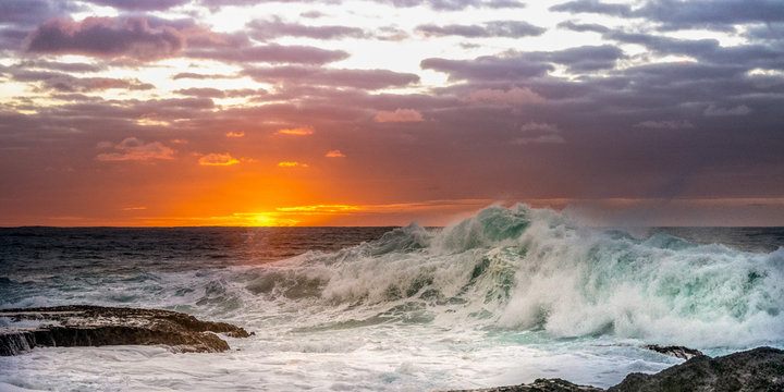 Sunrise and wave - Cemetery Bay, Norfolk Island © Bruce