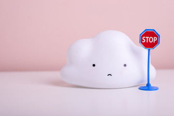 Sad cloud and stop sign