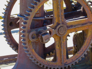 Rusty gear abandoned machinery in the desert