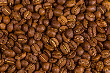 Background of many roasted coffee beans