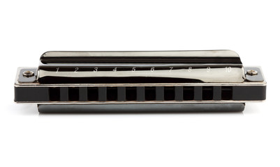 Diatonic harmonica isolated closeup.