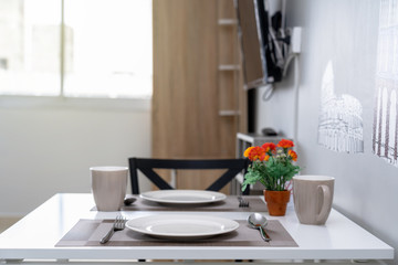 Luxury Interior living room and Dining table, Studio room type of condominium or apartment, service apartment and Accommodations Concept