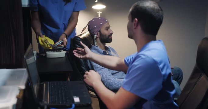 Health Care Professionals Working In Hospital with EEG