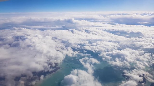 flying above clouds HD video. Daylight