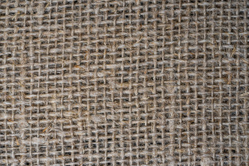 The texture of burlap. Rough background close up.