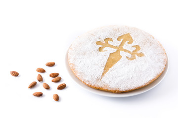 Tarta de Santiago. Traditional almond cake from Santiago in Spain, isolated on white background