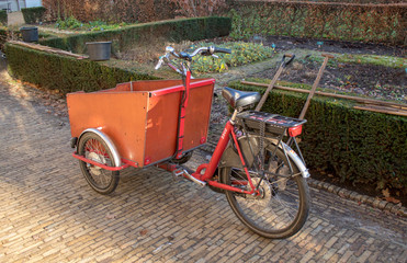 Carrier cycle in the gardens at the Begijnhof, Breda, the Netherlands