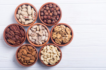 Mix of nuts : Pistachios, almonds , walnuts , pine nut , hazelnuts and cashew . Snack in bowl...