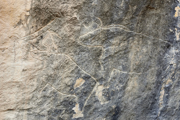 Ancient rock carvings petroglyphs in Gobustan National Park near Baku, Azerbaijan