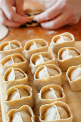 Making dumplings manti