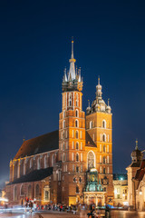 Krakow, Poland. Evening Night View Of St. Mary's Basilica And Cl