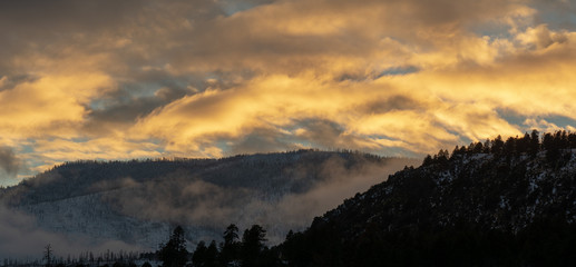 Sunset over the San Francisco Peaks mountain range in Flagstaff, Arizona, a popular ski, camp and hike location