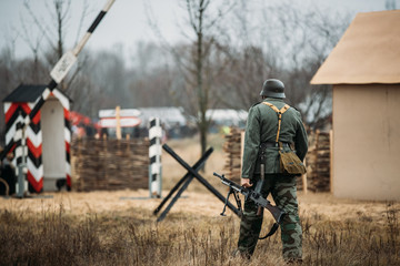 Re-enactor Dressed As World War II German Soldier Holding Zb-30 