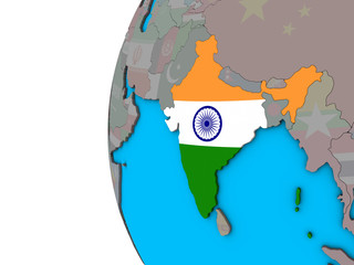 India with national flag on blue political 3D globe.