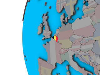 Belgium with national flag on blue political 3D globe.