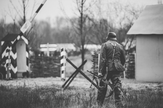 Re-enactor Dressed As World War II German Soldier Holding Zb-30 