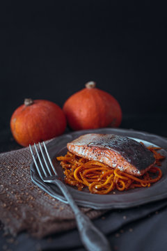 Salmon with pumpkin noodles