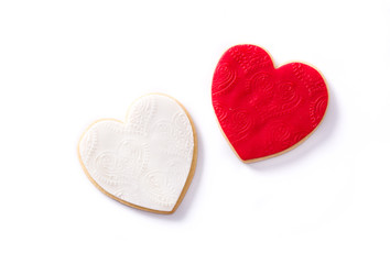 Obraz premium Heart-shaped cookies for Valentine's Day isolated on white background. Top view.