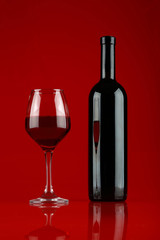 Glass and bottle of red wine