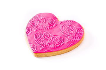 Pink heart-shaped cookie for Valentine's Day on white background. 