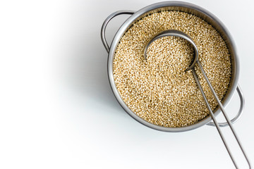 Raw white quinoa in a pan