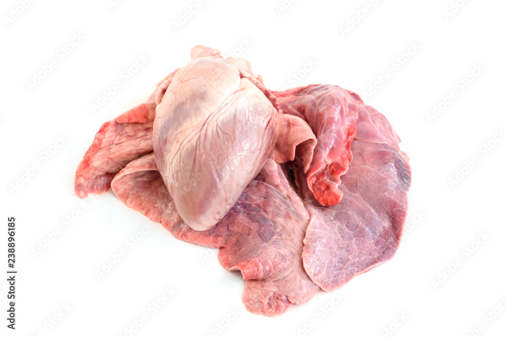 Wall mural Raw pork heart and lungs isolated on white background.