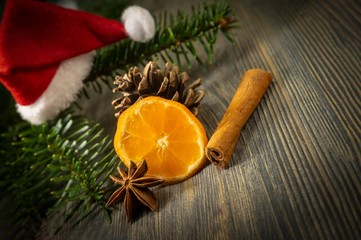 Red Santa hat cinnamon orange anise pine branch