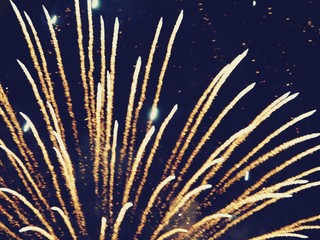 abstract, fireworks, blurred image. Christmas background. Light with glowing sparks, merry christmas