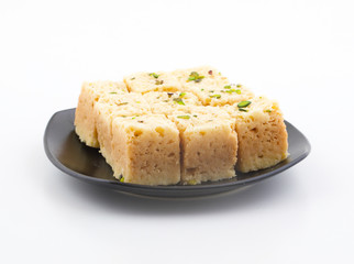 Indian Traditional Famous Sweet Food Mysore Pak or Mysoor Pak Isolated on White Background
