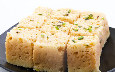 Indian Traditional Famous Sweet Food Mysore Pak or Mysoor Pak Isolated on White Background