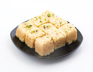 Indian Traditional Famous Sweet Food Mysore Pak or Mysoor Pak Isolated on White Background