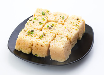 Indian Traditional Famous Sweet Food Mysore Pak or Mysoor Pak Isolated on White Background