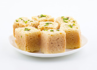 Indian Traditional Famous Sweet Food Mysore Pak or Mysoor Pak Isolated on White Background