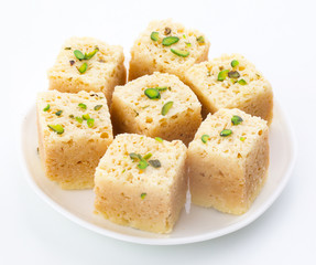 Indian Traditional Famous Sweet Food Mysore Pak or Mysoor Pak Isolated on White Background