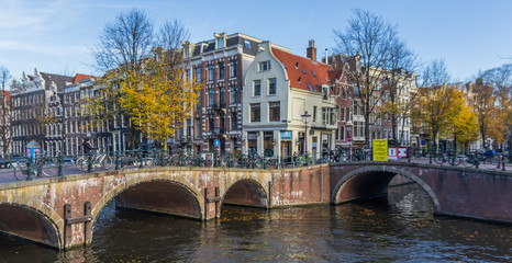 Fototapeta premium Amsterdam, Netherlands - main city and capital of the country, Amsterdam offers a splendid display of history and modernity, surrounded by the unique view of its canals