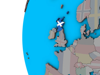 Scotland with national flag on blue political 3D globe.