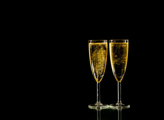 Elegant glasses filled with Champagne toasting for New year Romantic Celebration and Special moments