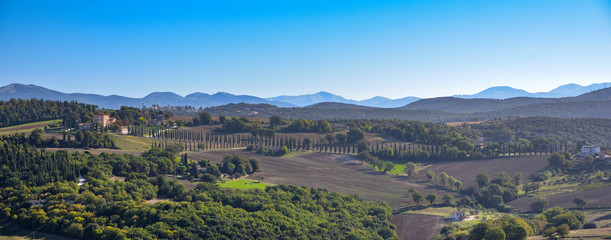 Fototapeta na wymiar View of the characteristic Italian countryside. Rural scene in relaxation.