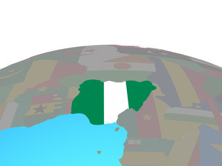 Nigeria with national flag on political globe.