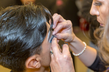 Fototapeta premium Hispanic (latin) male professional makeup