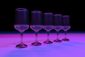 Transparent glasses. Color lighting background.